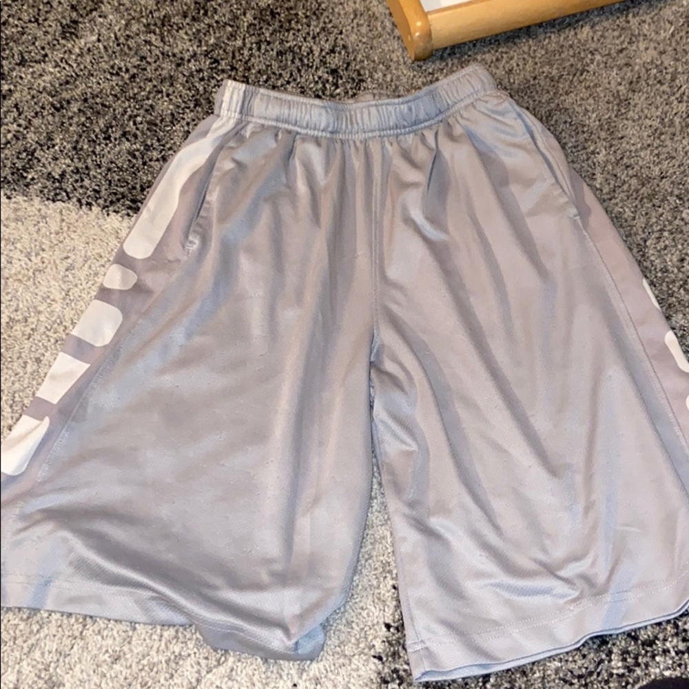 Grey nike elite shorts with a white stripe